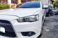 Selling Pearl White Mitsubishi Lancer 2010 in Quezon City-2