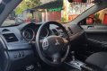 Selling Pearl White Mitsubishi Lancer 2010 in Quezon City-5