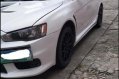 Pearl White Mitsubishi Lancer 2010 for sale in Quezon City-8
