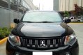 Selling Black Mitsubishi Strada 2017 in San Pedro-0