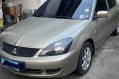 Selling Silver Mitsubishi Lancer 2010 in Quezon City-0