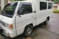 Selling White Mitsubishi L300 2014 in Cainta-1
