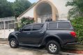 Sell Black 2013 Mitsubishi Strada in Manila-1