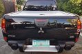 Selling Black Mitsubishi Strada 2012 in Marikina-6