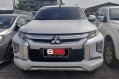 Selling Pearl White Mitsubishi Strada 2020 in Quezon-1