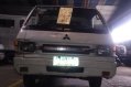 Selling White Mitsubishi L300 2012 in Quezon City-1