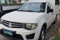 Sell White 2013 Mitsubishi L200 in Quezon City-1