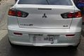 Pearl White Mitsubishi Lancer 2014 for sale in Caloocan-3