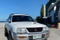 Selling Pearl White Mitsubishi L200 Strada 2003 in Manila-1