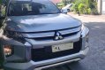 Selling Silver Mitsubishi Strada 2019 in Quezon -0