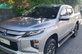 Selling Silver Mitsubishi Strada 2019 in Quezon -0