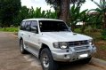Selling Pearl White Mitsubishi Pajero 2004 in Davao-1