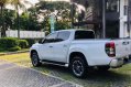 Pearl White Mitsubishi Strada 2019 for sale in Quezon -1