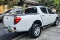 Selling White Mitsubishi Strada 2011 in Quezon City-3