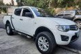 Selling White Mitsubishi Strada 2011 in Quezon City-0