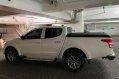 Sell White 2015 Mitsubishi Strada in San Juan-2