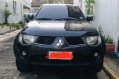 Selling Black Mitsubishi Strada 2009 in Manila-1