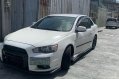 White Mitsubishi Lancer 2010 for sale in Quezon City-2