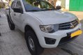 Sell White 2014 Mitsubishi Strada in Makati-1