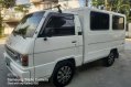 Sell White 2011 Mitsubishi L300 in Quezon City-1