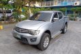Sell White 2012 Mitsubishi Strada in Quezon City-1