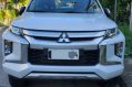 Sell Pearl White 2020 Mitsubishi Strada in Pasig-0