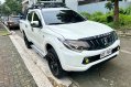Sell White 2016 Mitsubishi Strada in Quezon City-8