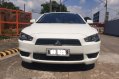 White Mitsubishi Lancer 2014 for sale in Quezon City-1