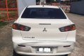 White Mitsubishi Lancer 2014 for sale in Quezon City-2