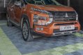 Orange Mitsubishi Xpander Cross 2023 for sale in Automatic-0