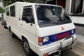 Selling White Mitsubishi L300 2015 in Quezon City-1