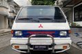 Selling White Mitsubishi L300 2015 in Quezon City-0