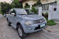 Selling White Mitsubishi Strada 2012 in Quezon City-1