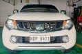 Sell White 2019 Mitsubishi Strada in Quezon City-0