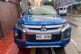 Sell White 2019 Mitsubishi Strada in Quezon City-0