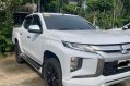 Selling White Mitsubishi Strada 2020 in Quezon City-1
