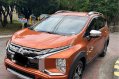 Selling Orange Mitsubishi Xpander Cross 2022 in Pasig-1