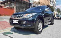 Selling Black Mitsubishi Strada 2016 Manual Diesel at 35000 km in Quezon City