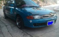 Selling Blue Mitsubishi Lancer 1995 at 161219 km in Quezon City