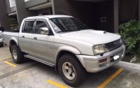 White Mitsubishi Strada 2001 for sale in Quezon City