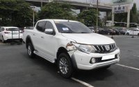Selling White Mitsubishi Strada 2018 Automatic Diesel 