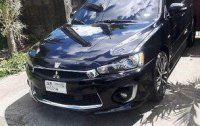 Black Mitsubishi Lancer Ex 2016 at 32000 km for sale 