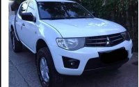 Sell White 2012 Mitsubishi Strada in Concepcion