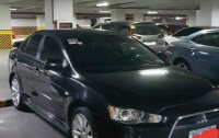 Selling Black Mitsubishi Lancer 2012 in Caloocan