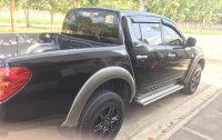 Black Mitsubishi Strada 2013 Truck for sale in Lumban