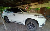 Selling White Mitsubishi Montero in Trinidad