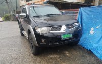 Black Mitsubishi Strada 2013 for sale in Baguio City