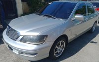 Sell Pearl White Mitsubishi Lancer in Quezon City