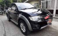 Black Mitsubishi Strada 2010 for sale in Rizal