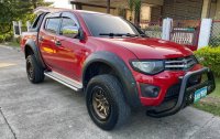 Selling Red Mitsubishi Strada 2013 in Cebu City